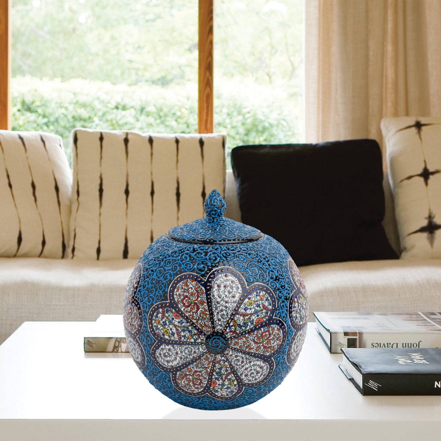 Hand-painted Blue Blossom globe jar with layered floral motifs and raised blue scrollwork. Spherical ceramic jar, artisan-made, perfect décor or gift.