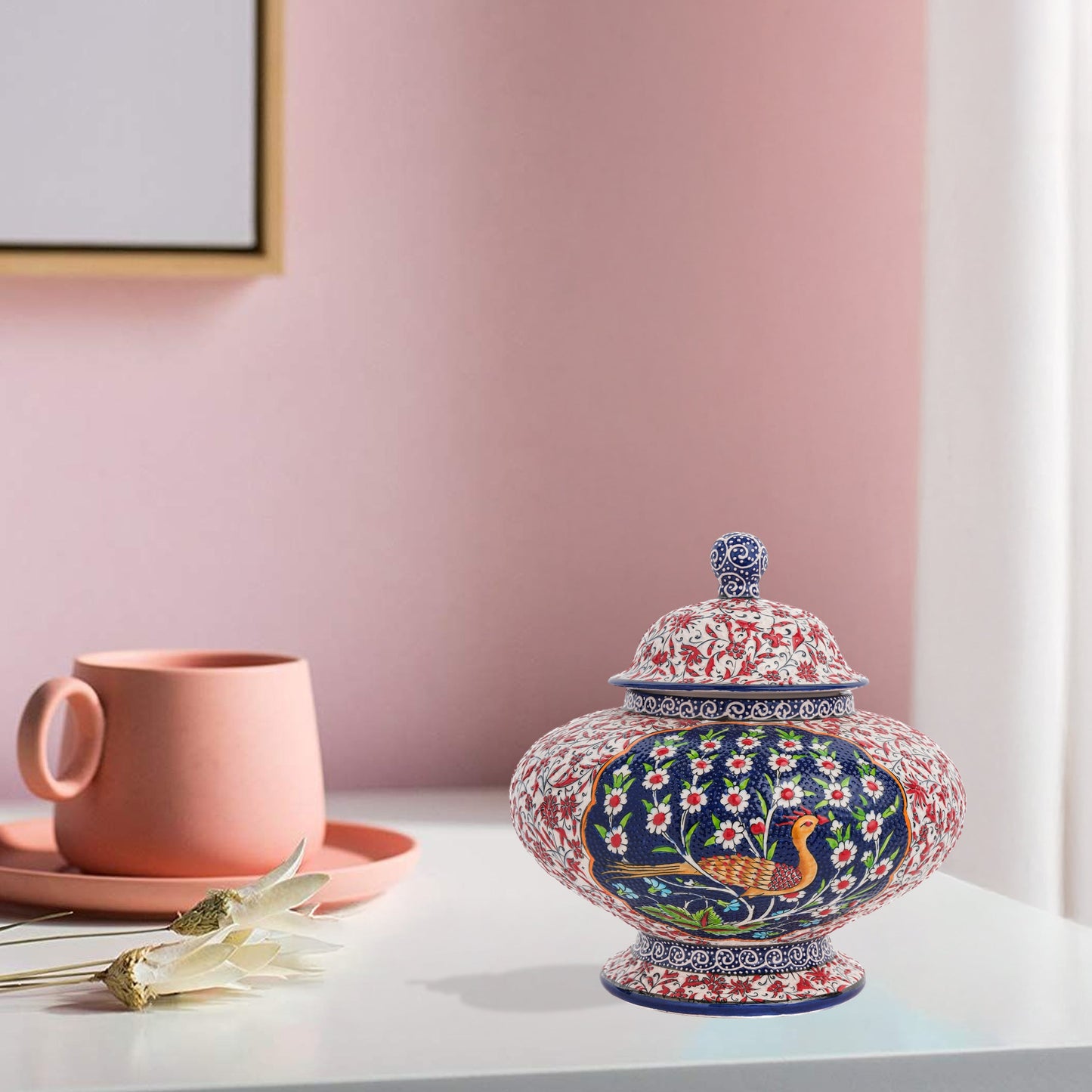 Hand-painted Songbird Bloom ceramic jar with bird and daisy motifs in navy, red & green. Wide artisan jar, glossy glazed, perfect décor accent or gift.