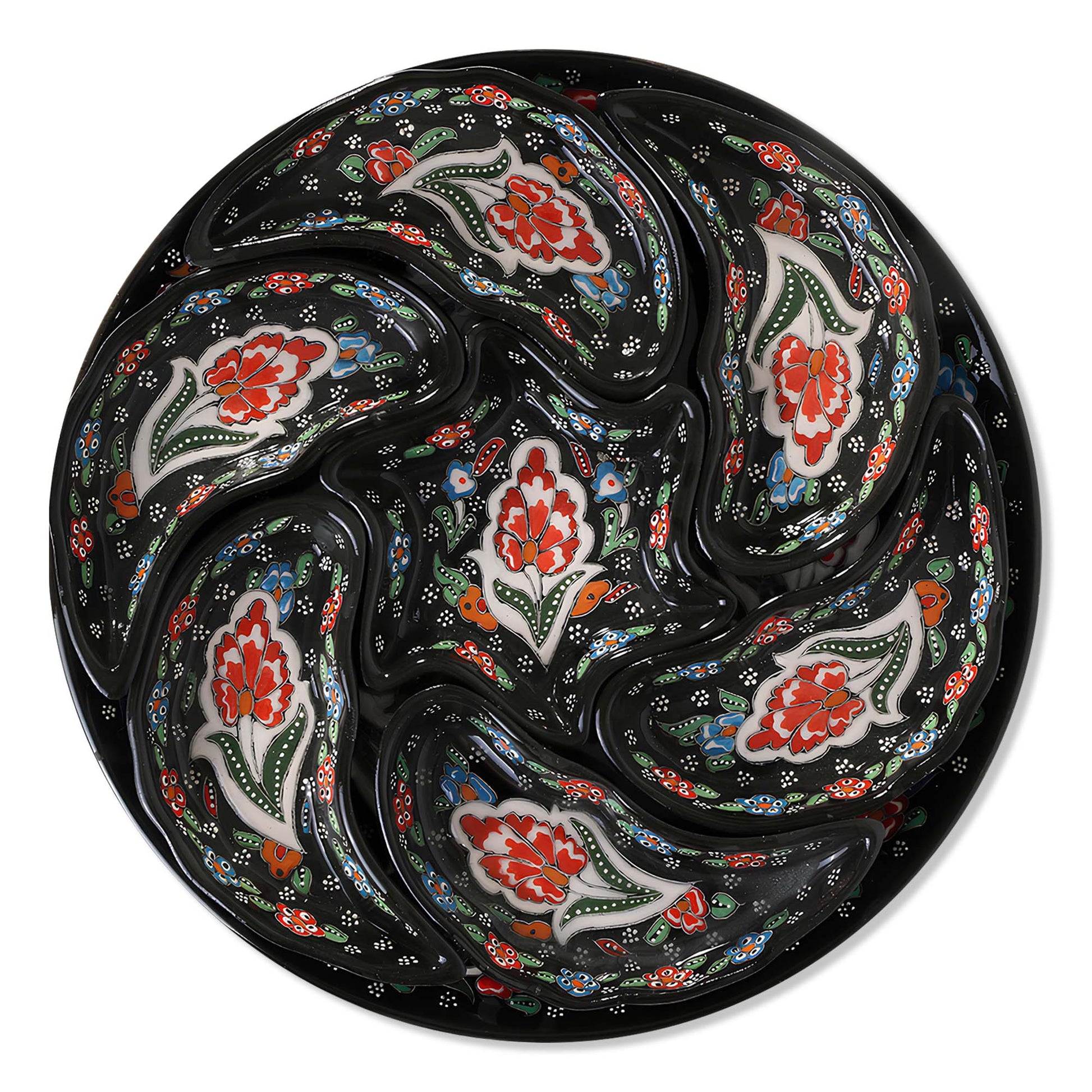Set of ceramic snack serving trays  with floral patterns on a black background