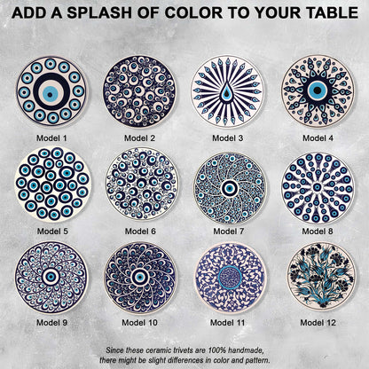 Ceramic trivets with blue and white patterns on a gray background