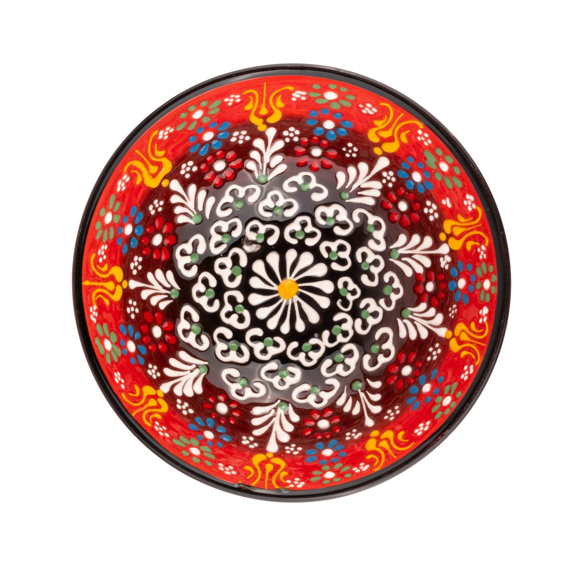 Ceramic cereal bowl with intricate floral patterns on a white background