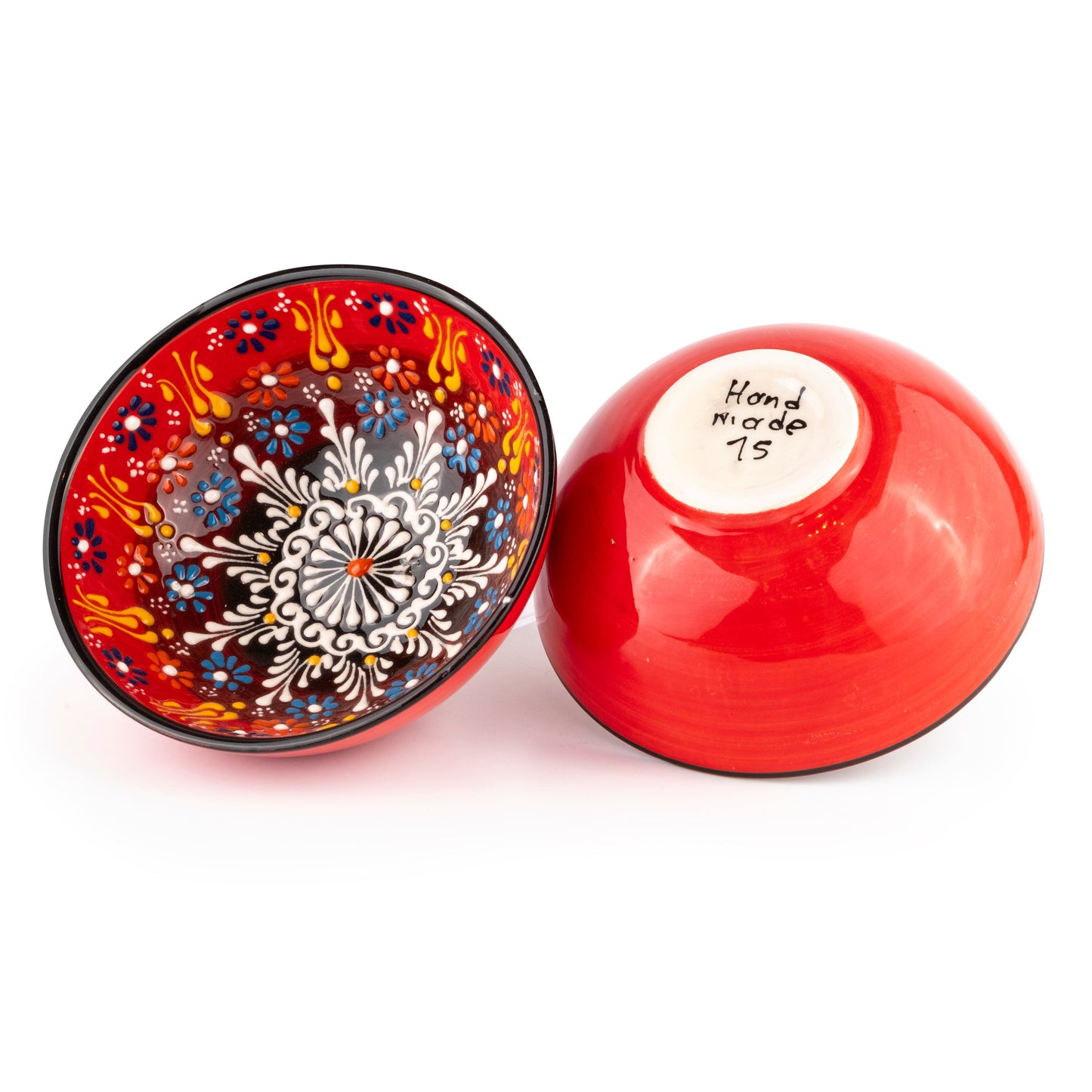 Ceramic serving bowl with decorative pattern on a white background