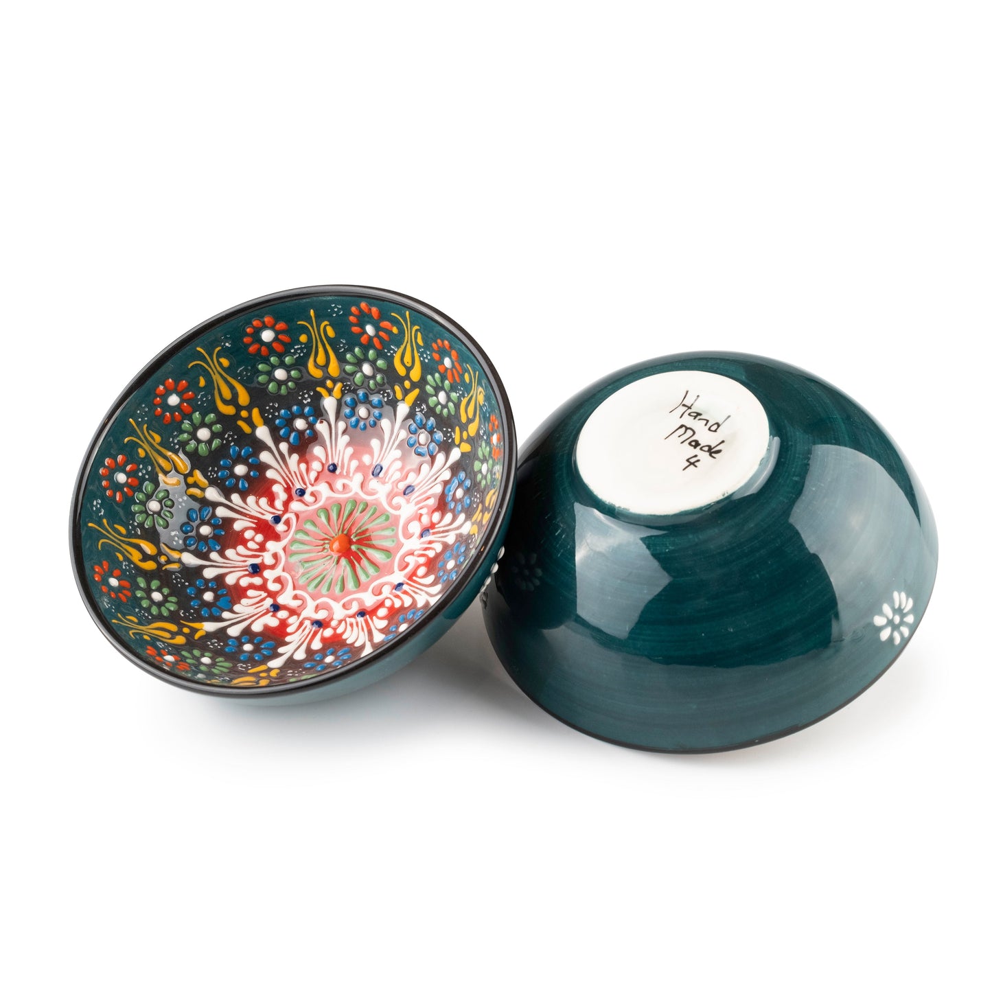 Decorative ceramic salad bowl with intricate patterns on a white background