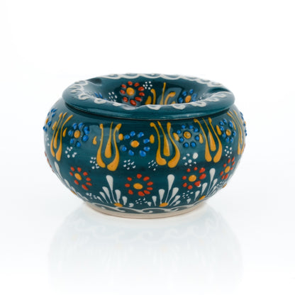 Decorative ceramic ashtray with colorful patterns on a white background