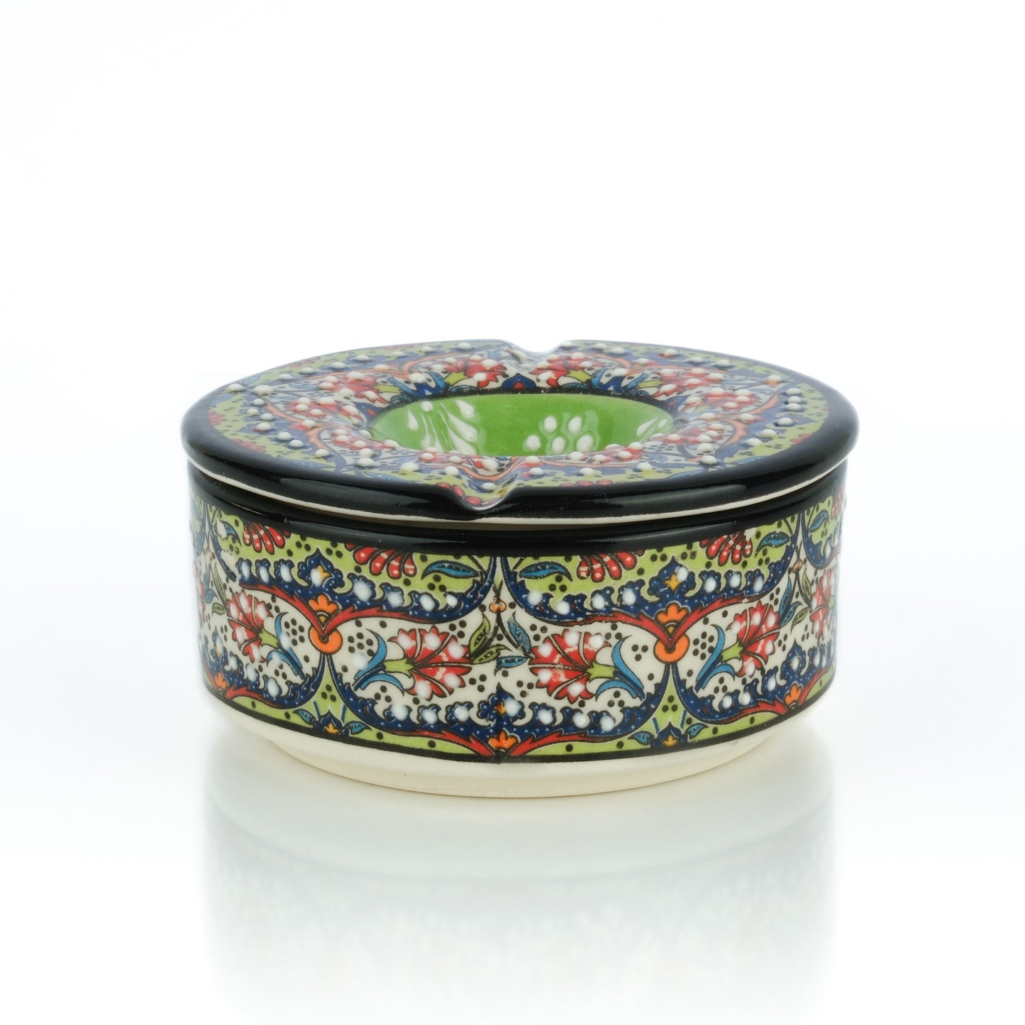 Decorative ceramic ashtray with floral pattern on a white background
