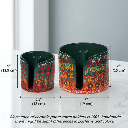 Two ceramic paper towel holders with colorful patterns and measurements on a white background.
