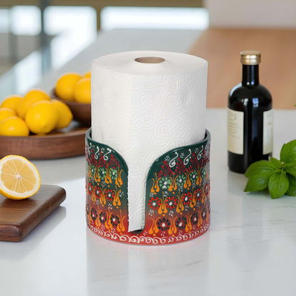 Decorative paper towel holder with colorful design on a kitchen counter.