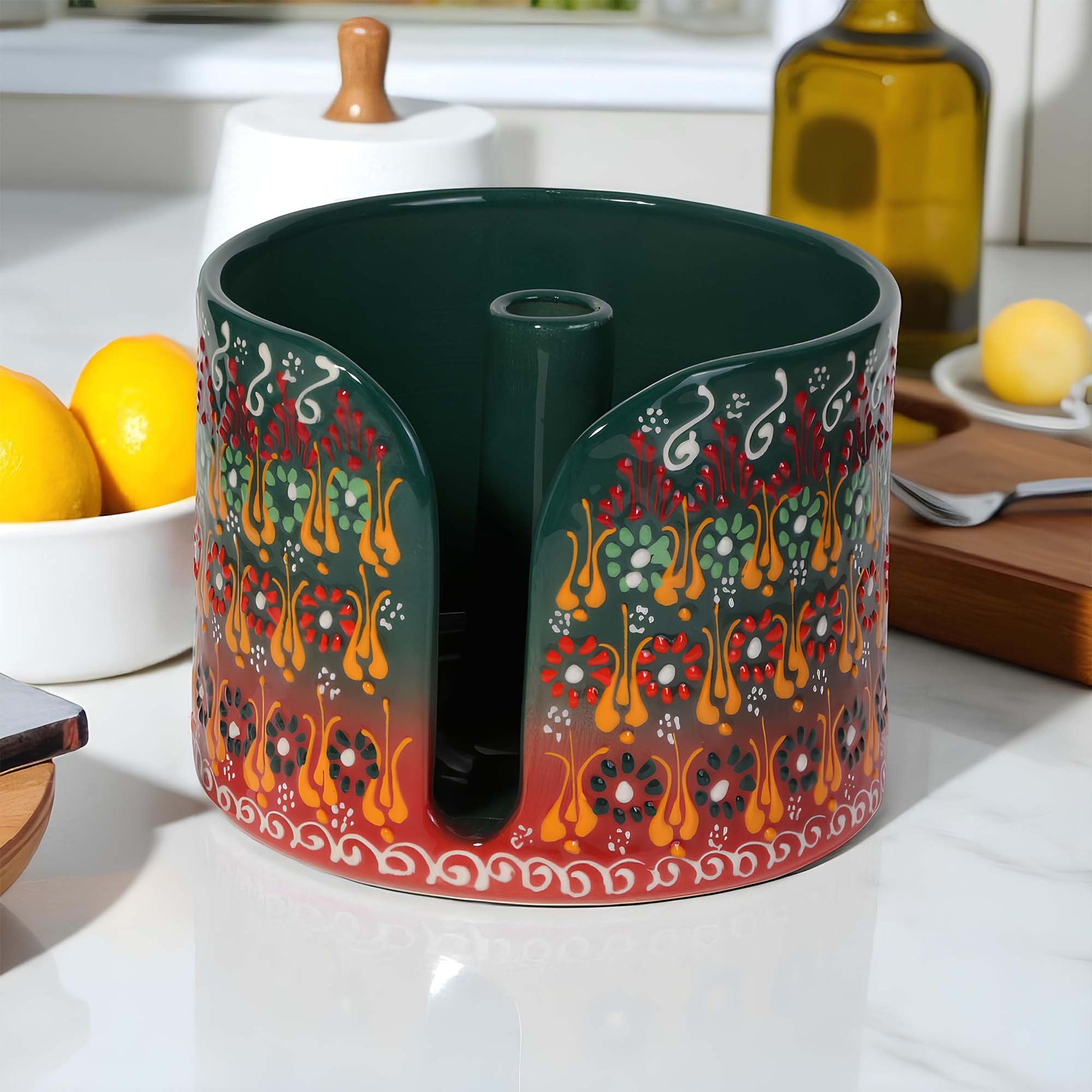 Decorative paper towel holder with colorful patterns on a kitchen counter.