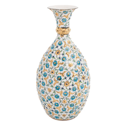 A handcrafted ceramic decorative bottle with hand-painted turquoise and gold floral patterns against an ivory base.