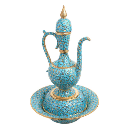 A hand-painted ceramic decorative ewer set with a turquoise floral motif and gold detailing, including a tall slender-necked ewer with a pointed lid and a matching ceramic basin.