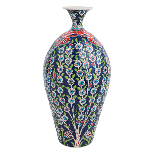 A hand-painted ceramic decorative bottle with a floral pattern, featuring blooming turquoise flowers and delicate green leaves on a rich navy background.