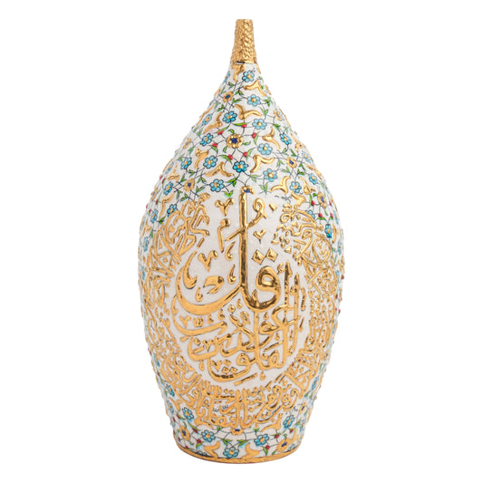A hand-painted ceramic bottle with golden Quranic script and floral white background, featuring turquoise blossoms.