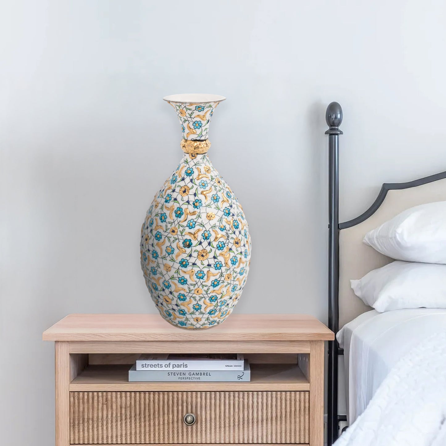 Hand-painted ceramic decorative bottle with turquoise and gold floral motifs on ivory. Glossy artisan vase, elegant décor accent, perfect for gifting.