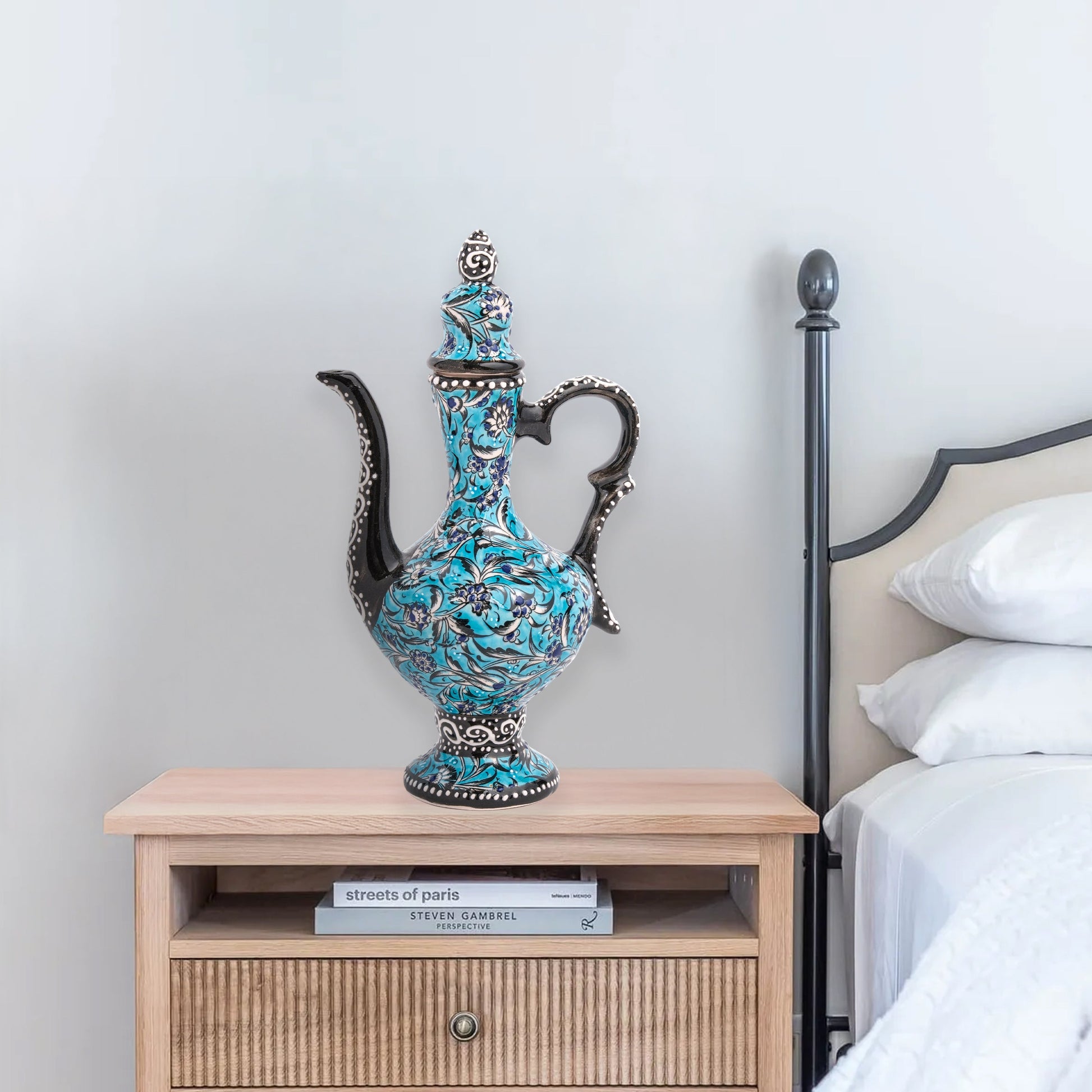 Hand-painted turquoise Ottoman-style ceramic ewer with floral motifs, curved spout & sculptural handle. Decorative artisan piece, perfect décor or gift.
