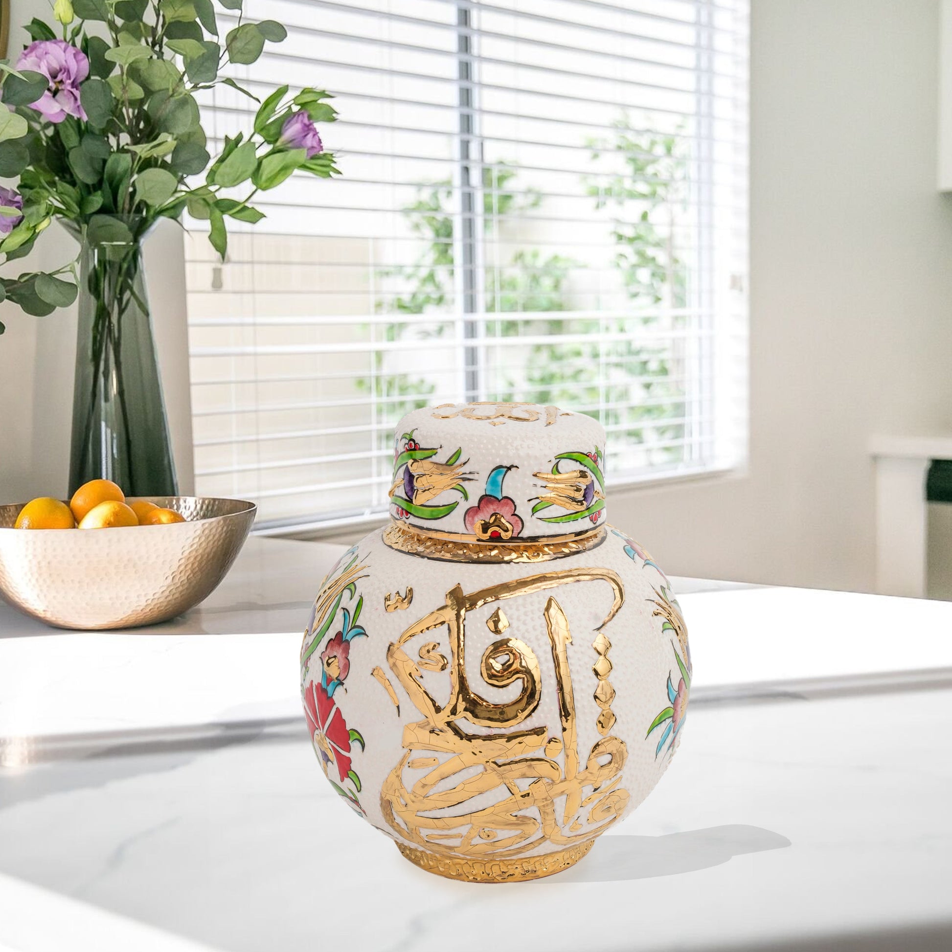 Hand-painted Gold Calligraphy ceramic jar with Ottoman floral motifs & Arabic script. Round melon-shaped design, glossy glazed, perfect décor or gift.