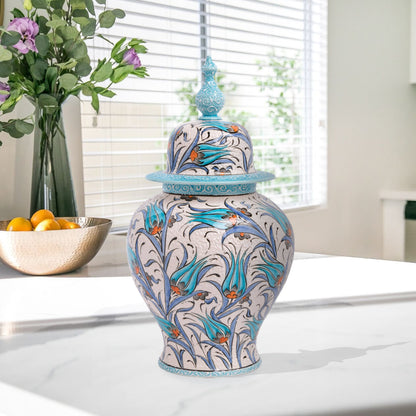 Hand-painted Blue Tulip ceramic jar with Ottoman floral motifs in blue and orange. Finished with turquoise lid, artisan-made, perfect décor or collector’s gift.