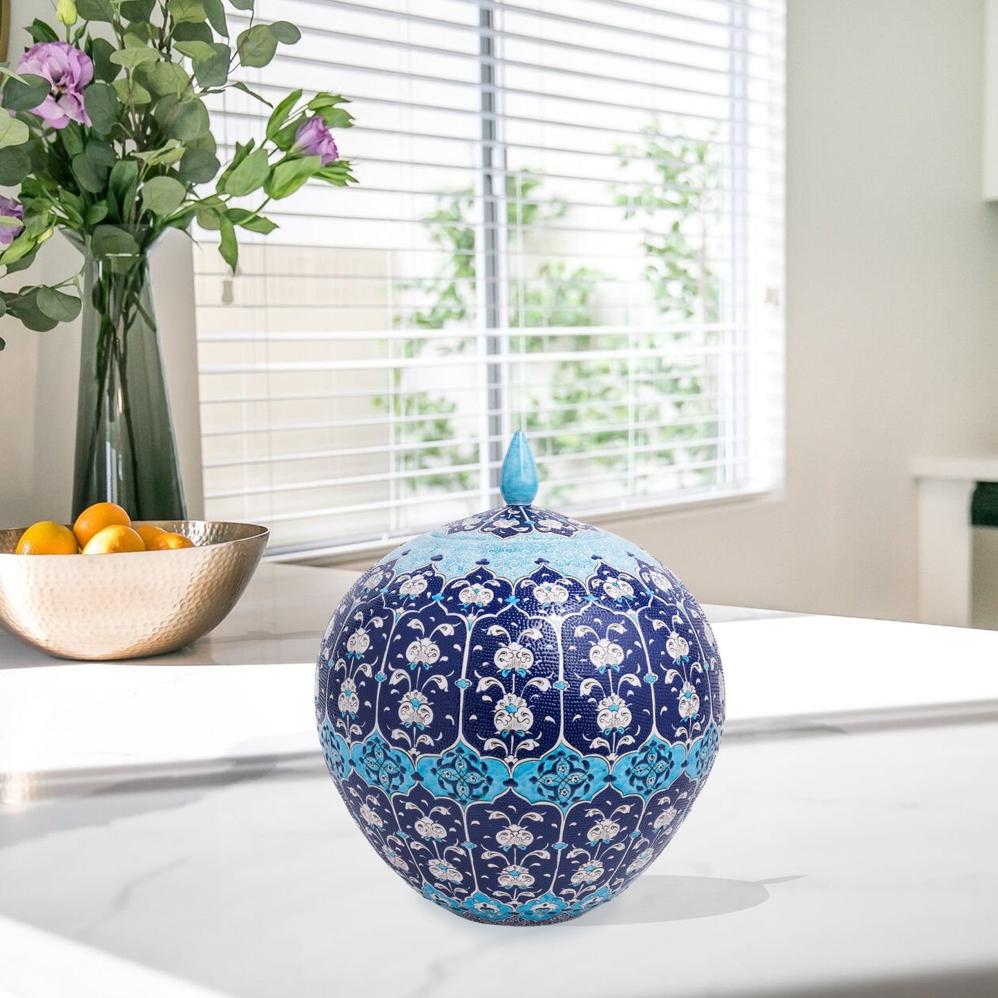 Hand-painted Ottoman Blue globe jar with white floral motifs on navy and turquoise. Round lidded ceramic jar, artisan-made, perfect décor or gift.