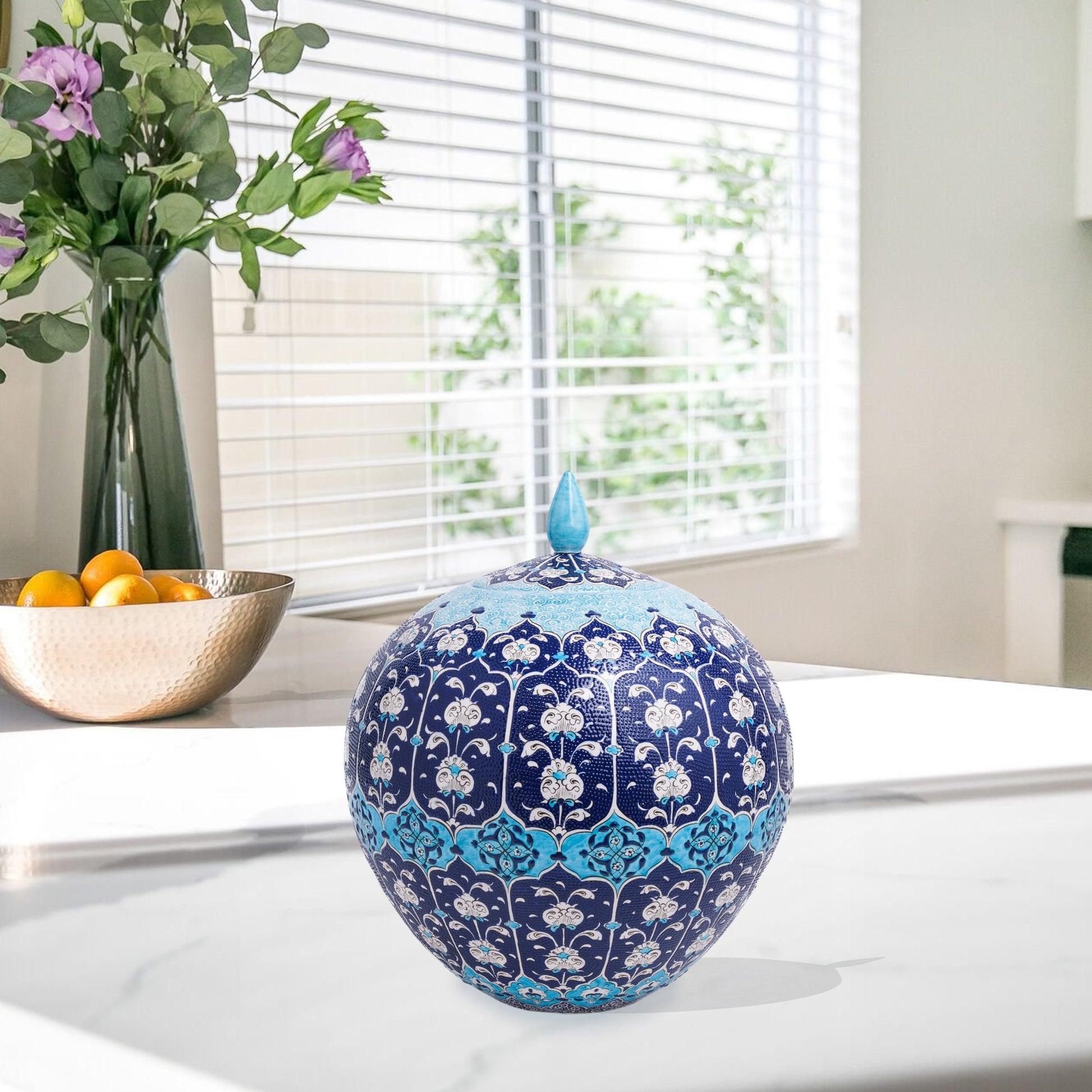 Hand-painted Ottoman Blue globe jar with white floral motifs on navy and turquoise. Round lidded ceramic jar, artisan-made, perfect décor or gift.
