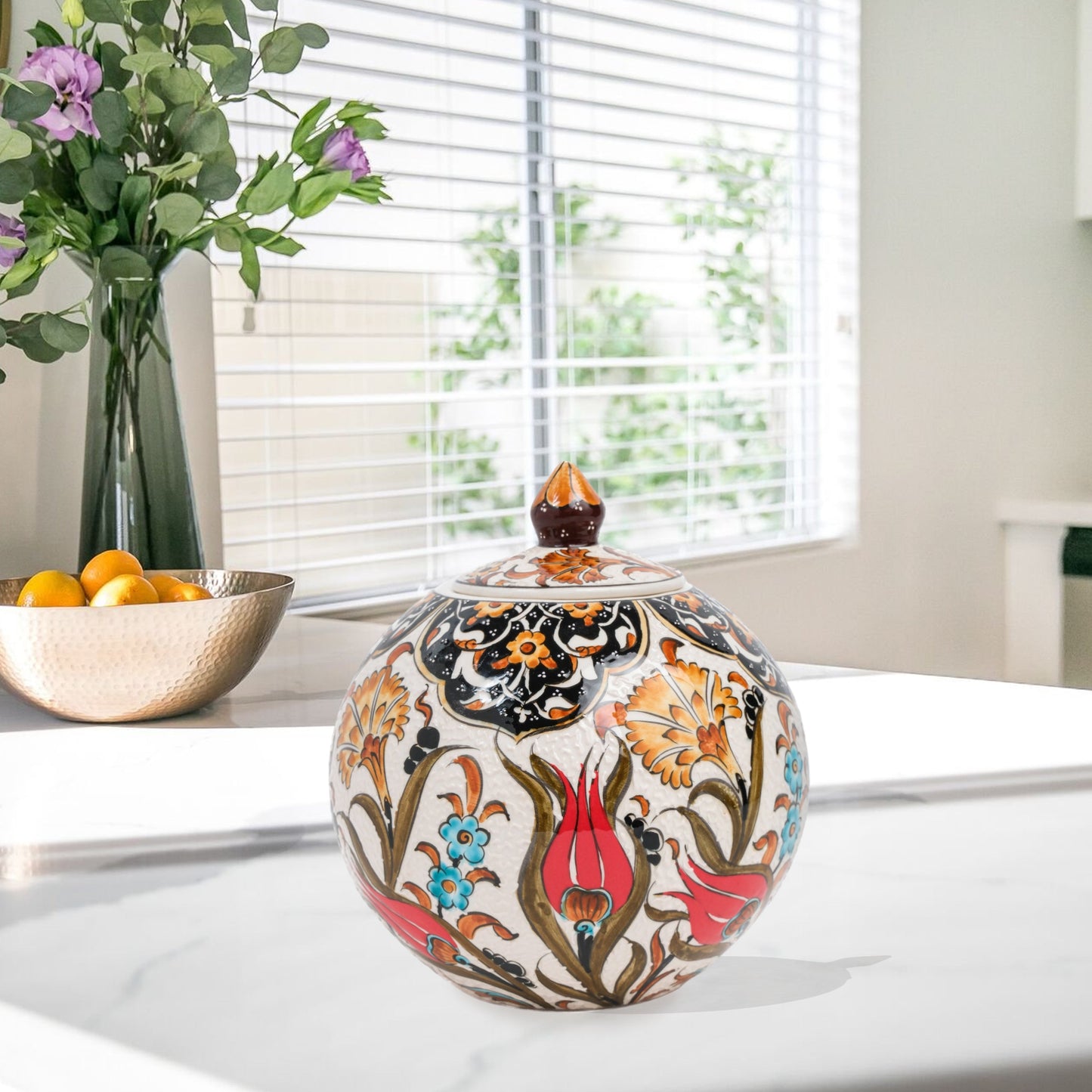 Hand-painted Red Tulip globe jar with Ottoman floral motifs in red, blue & gold. Glossy round ceramic jar, artisan-crafted, perfect décor or thoughtful gift.