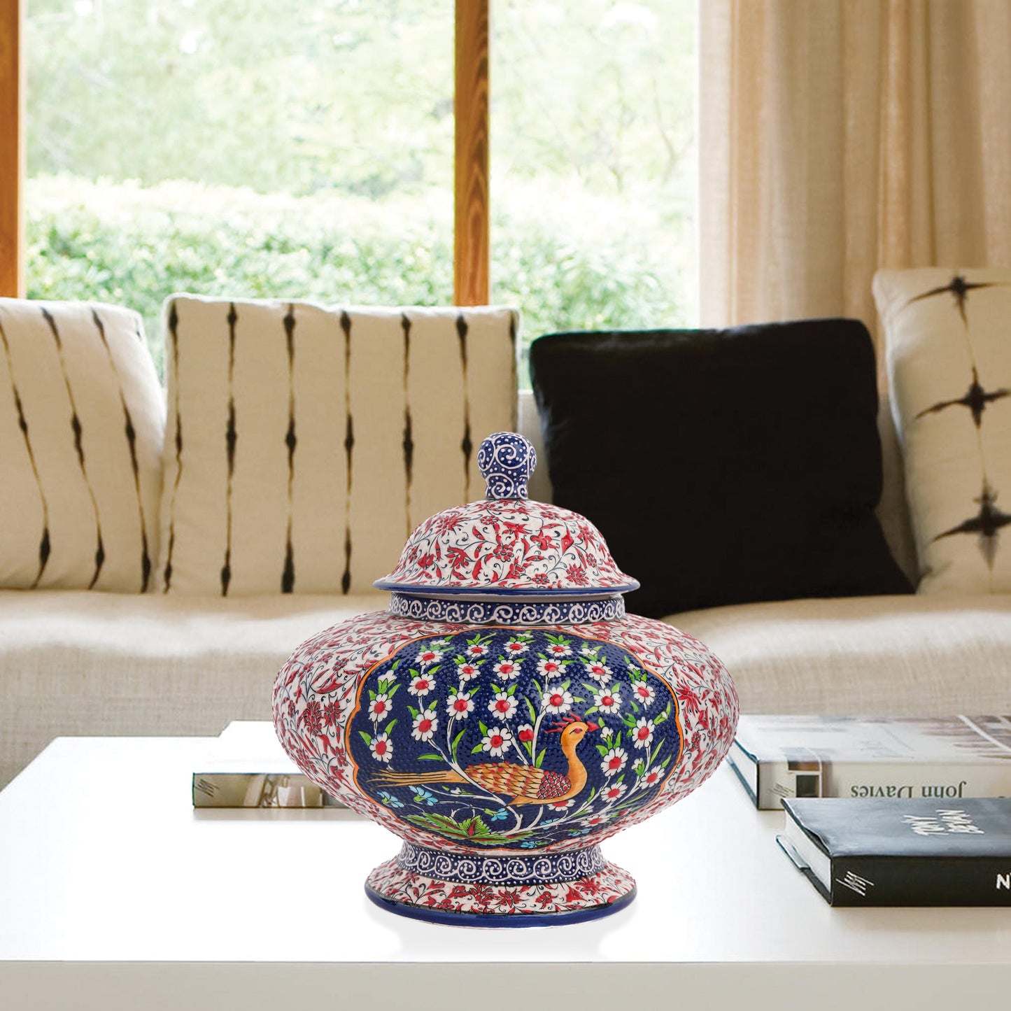 Hand-painted Songbird Bloom ceramic jar with bird and daisy motifs in navy, red & green. Wide artisan jar, glossy glazed, perfect décor accent or gift.