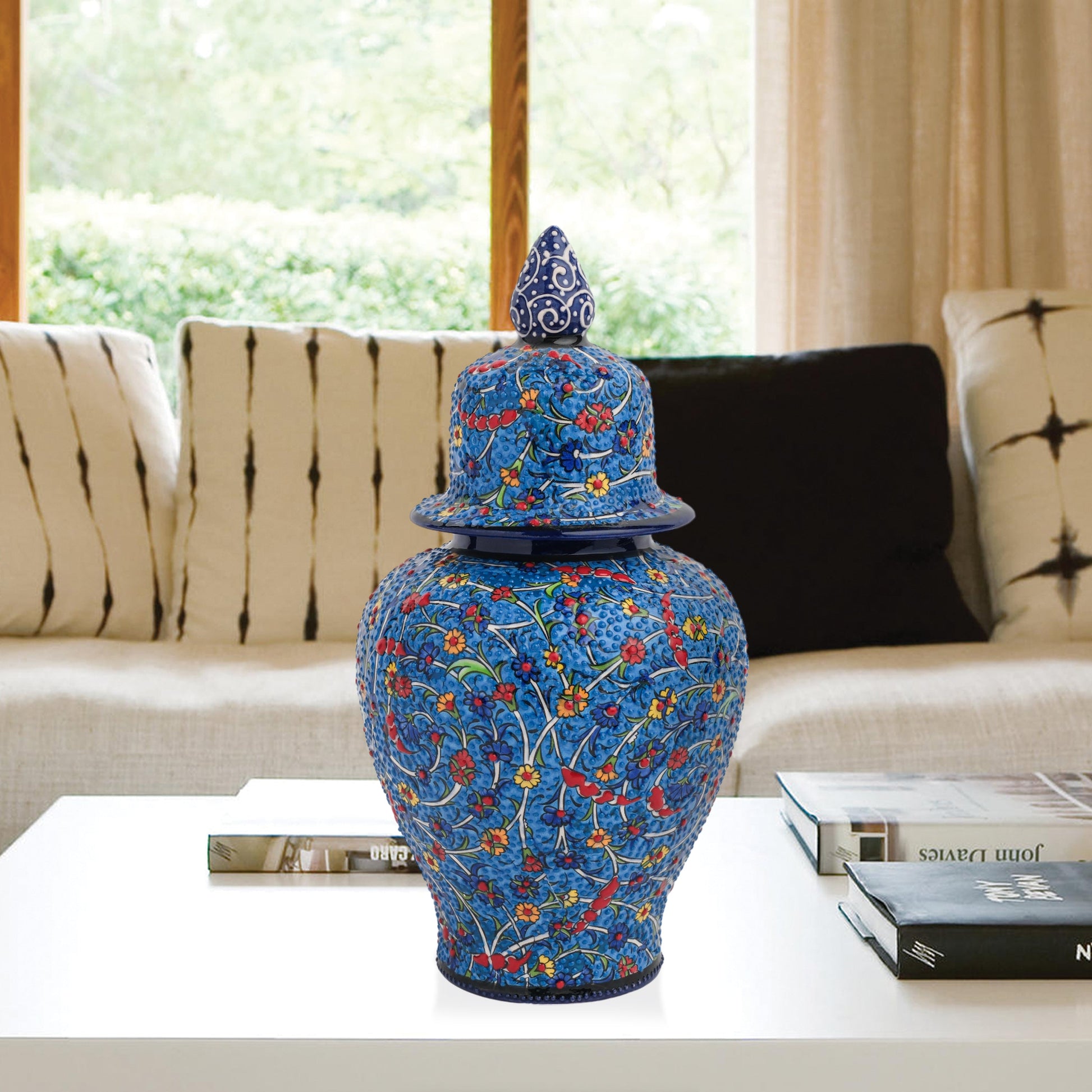 Hand-painted Blossom Night ceramic jar with vivid yellow, red & blue florals on cobalt base. Glossy artisan jar with ornate finial, perfect décor or gift.