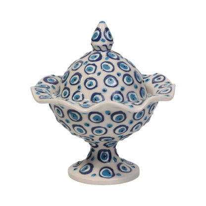 Ceramic sugar bowl with blue and white pattern on a white background
