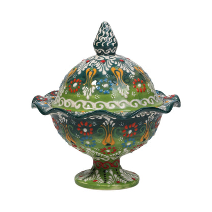 Decorative ceramic sugar bowl with colorful floral patterns on a white background