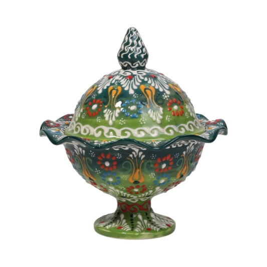 Decorative ceramic sugar bowl with colorful floral patterns on a white background