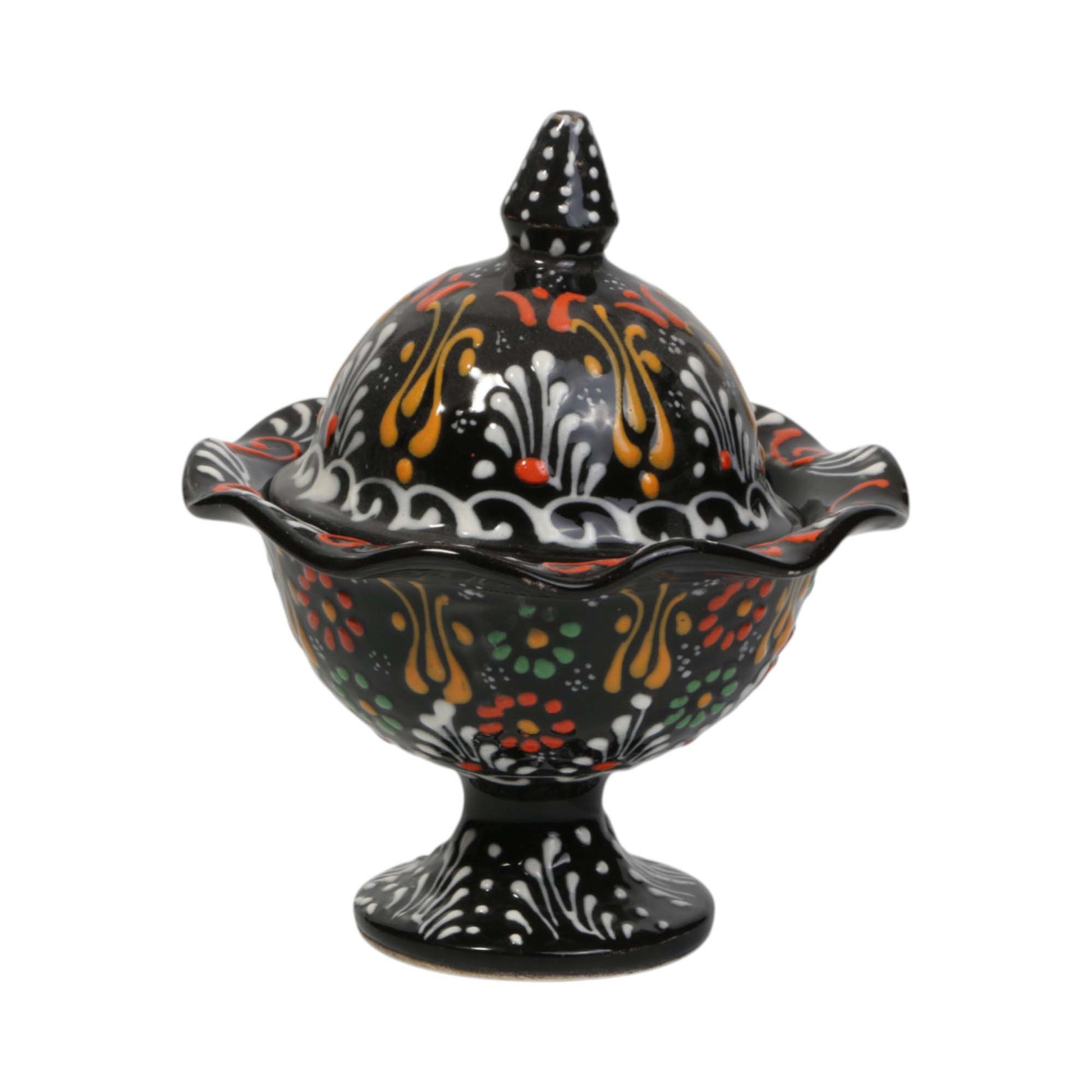 Decorative ceramic sugar bowl with a lid on a white background