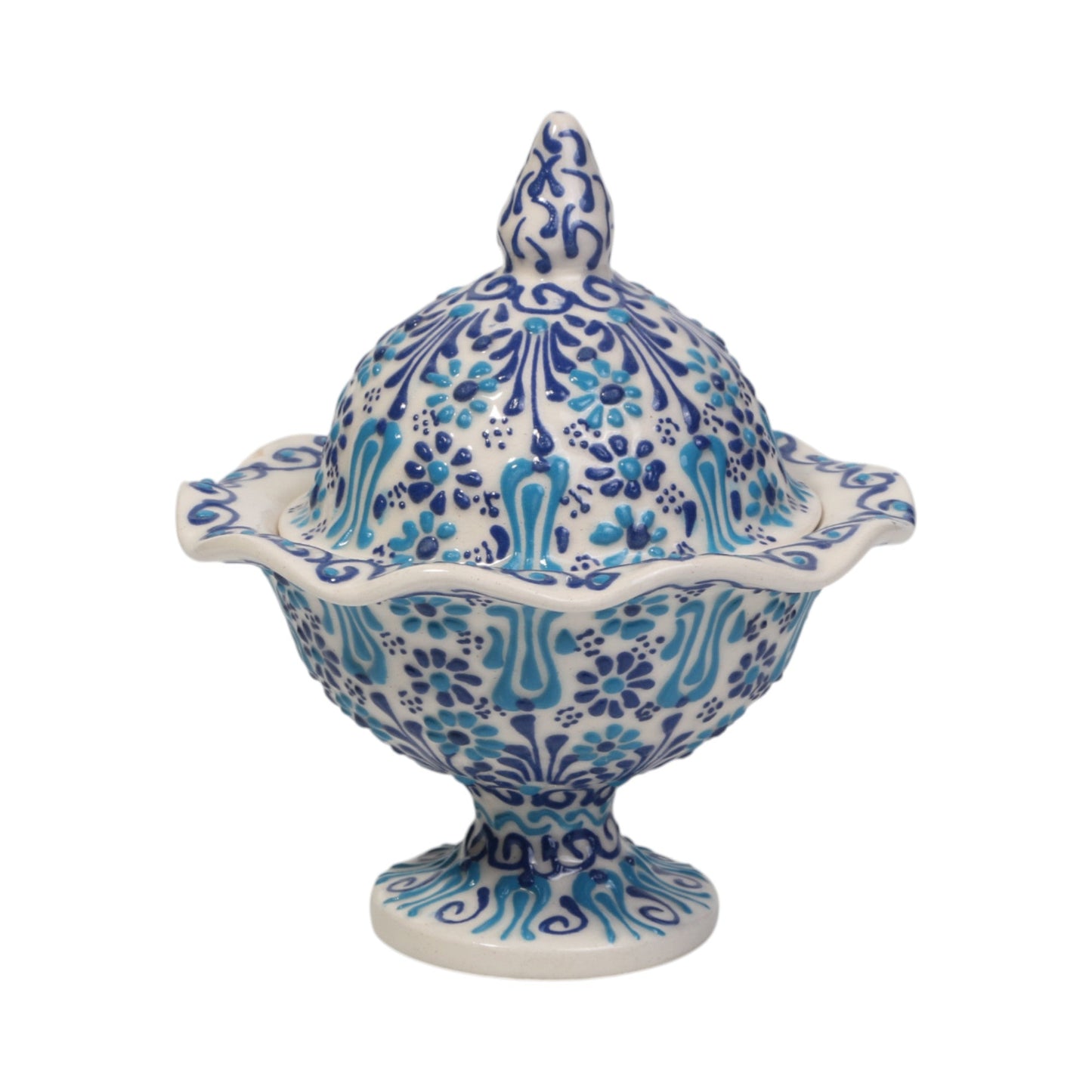 Ceramic sugar bowl with blue and white floral pattern on a white background