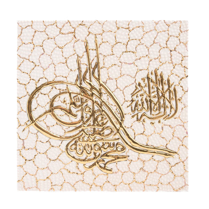 A handmade ceramic tile featuring a radiant golden Tughra calligraphy design on a textured ivory background.