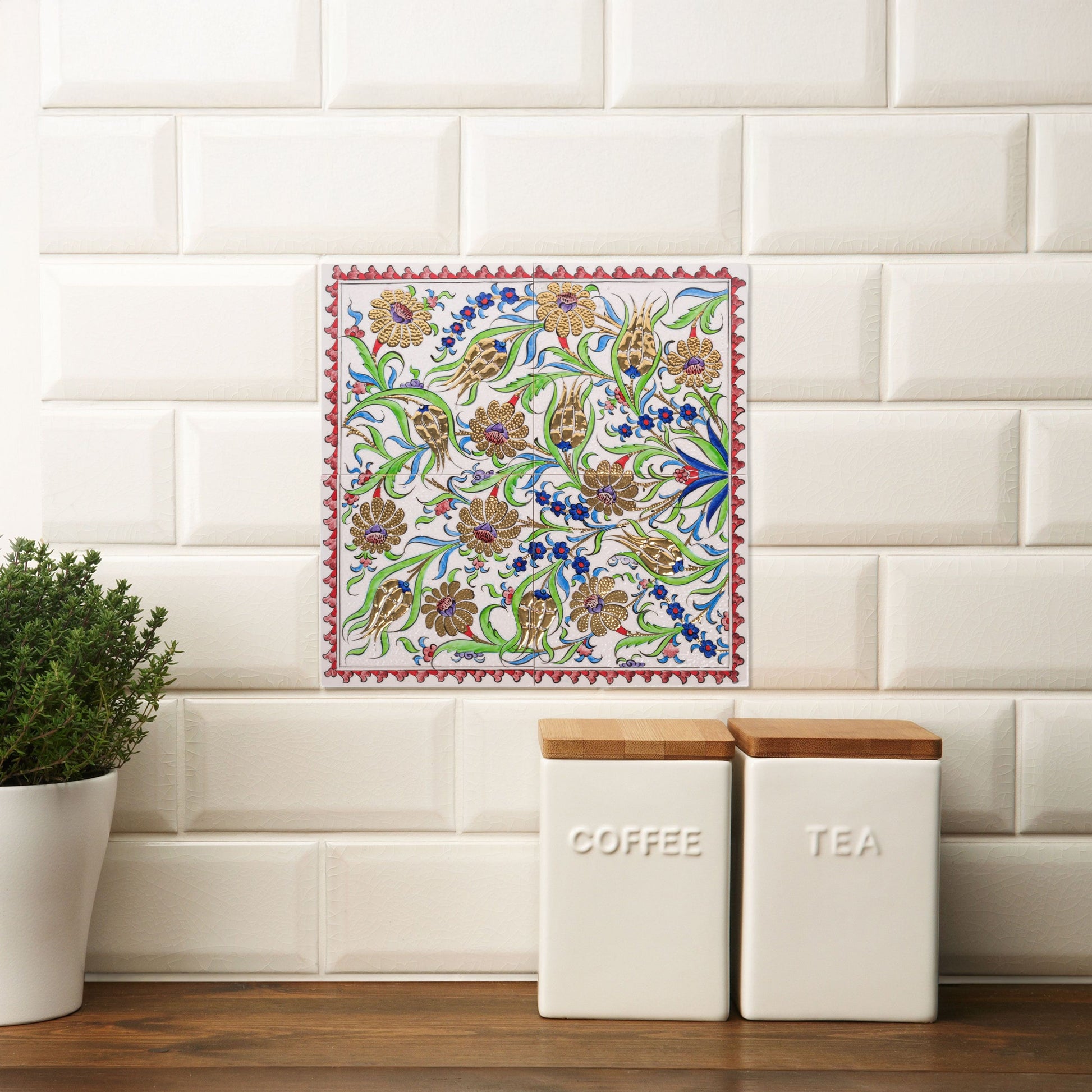 Decorative kitchen towel with floral pattern on a ceramic tile background.