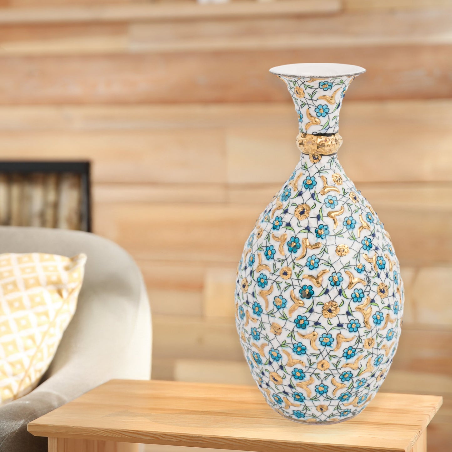 Hand-painted ceramic decorative bottle with turquoise and gold floral motifs on ivory. Glossy artisan vase, elegant décor accent, perfect for gifting.