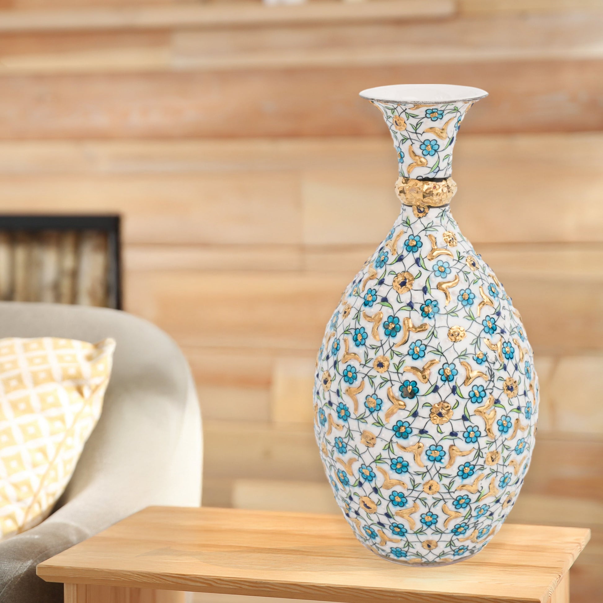 Hand-painted ceramic decorative bottle with turquoise and gold floral motifs on ivory. Glossy artisan vase, elegant décor accent, perfect for gifting.