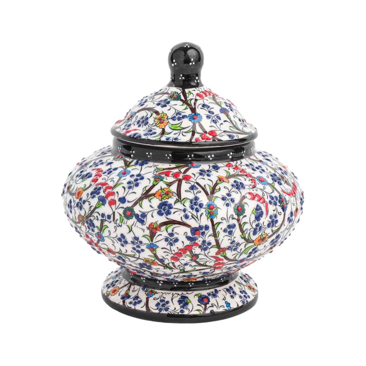 Handmade ceramic jar with a floral meadow design, featuring a lid, in a glossy finish.