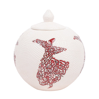 A hand-painted ceramic round jar with a red whirling dervish calligraphy design on a white background, featuring a lid with a rounded handle on top.