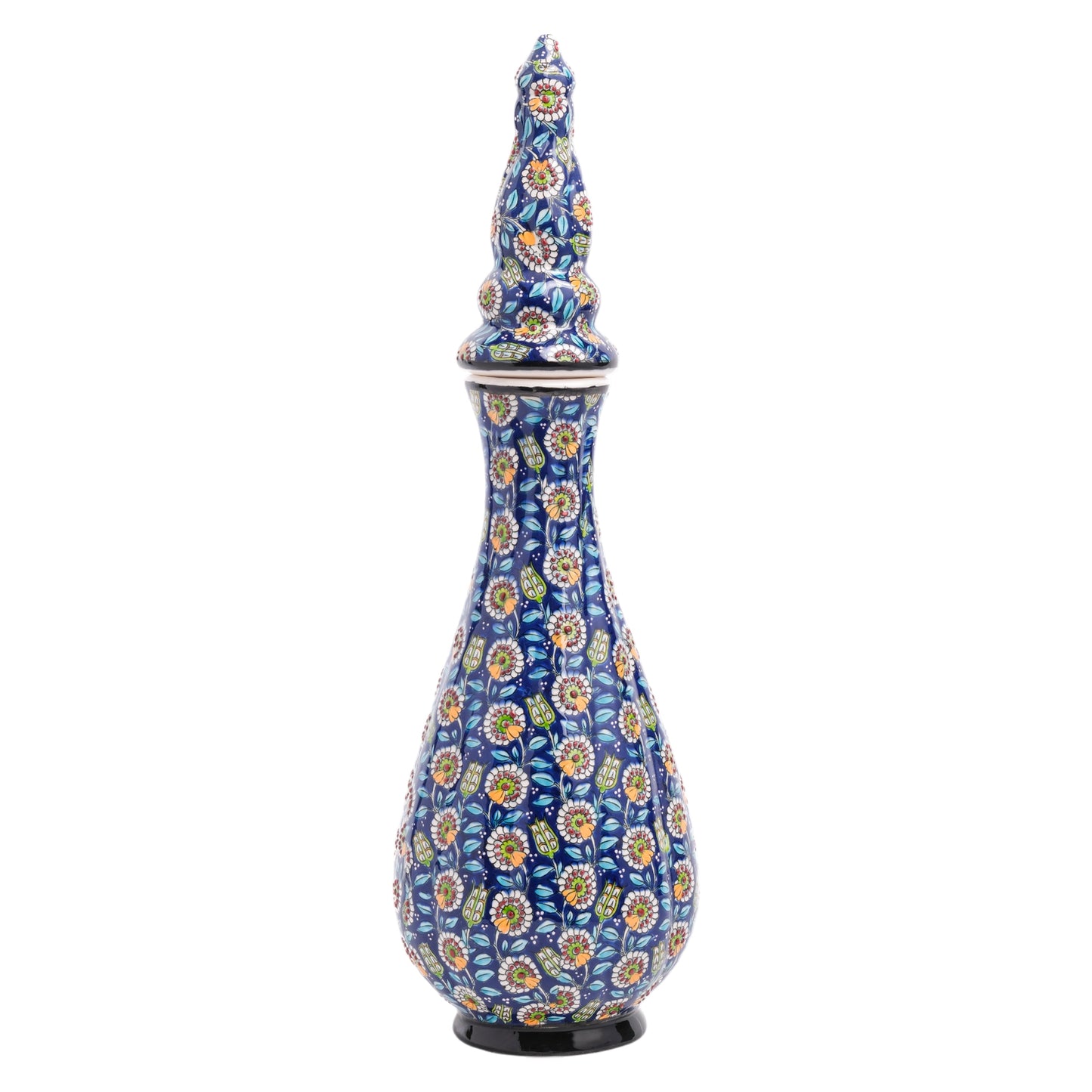 A handmade ceramic jar with a teardrop silhouette, featuring a navy blue base and vibrant floral patterns in white, yellow, and red, with a sculpted ornamental lid.