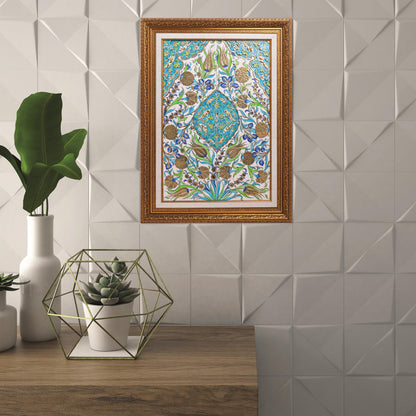 Decorative ceramic tile on a wall with geometric tile design, plants, and a wooden shelf.
