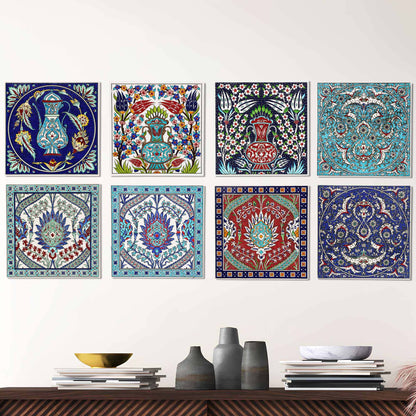 Set of colorful decorative ceramic tiles on a wall above a wooden shelf with vases and books.