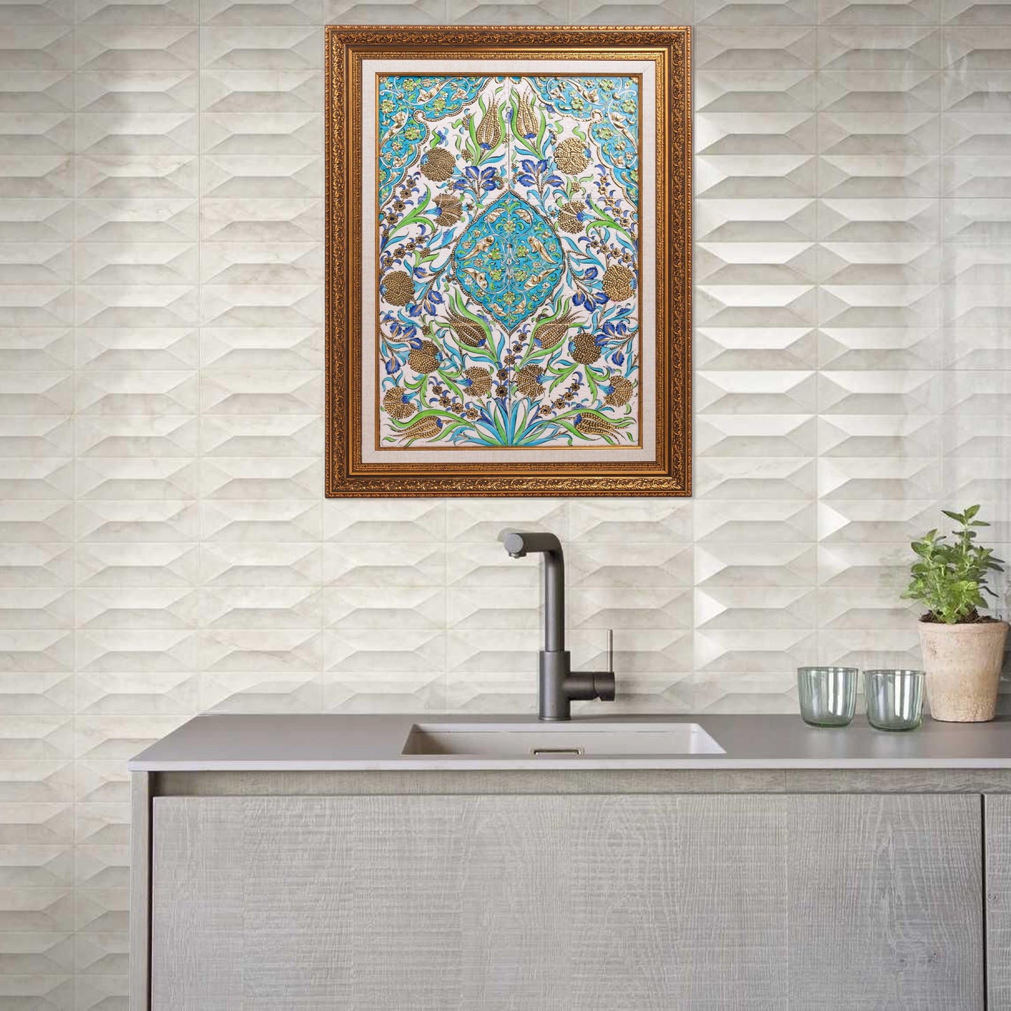 Decorative kitchen with patterned ceramic tile and framed artwork above a sink.