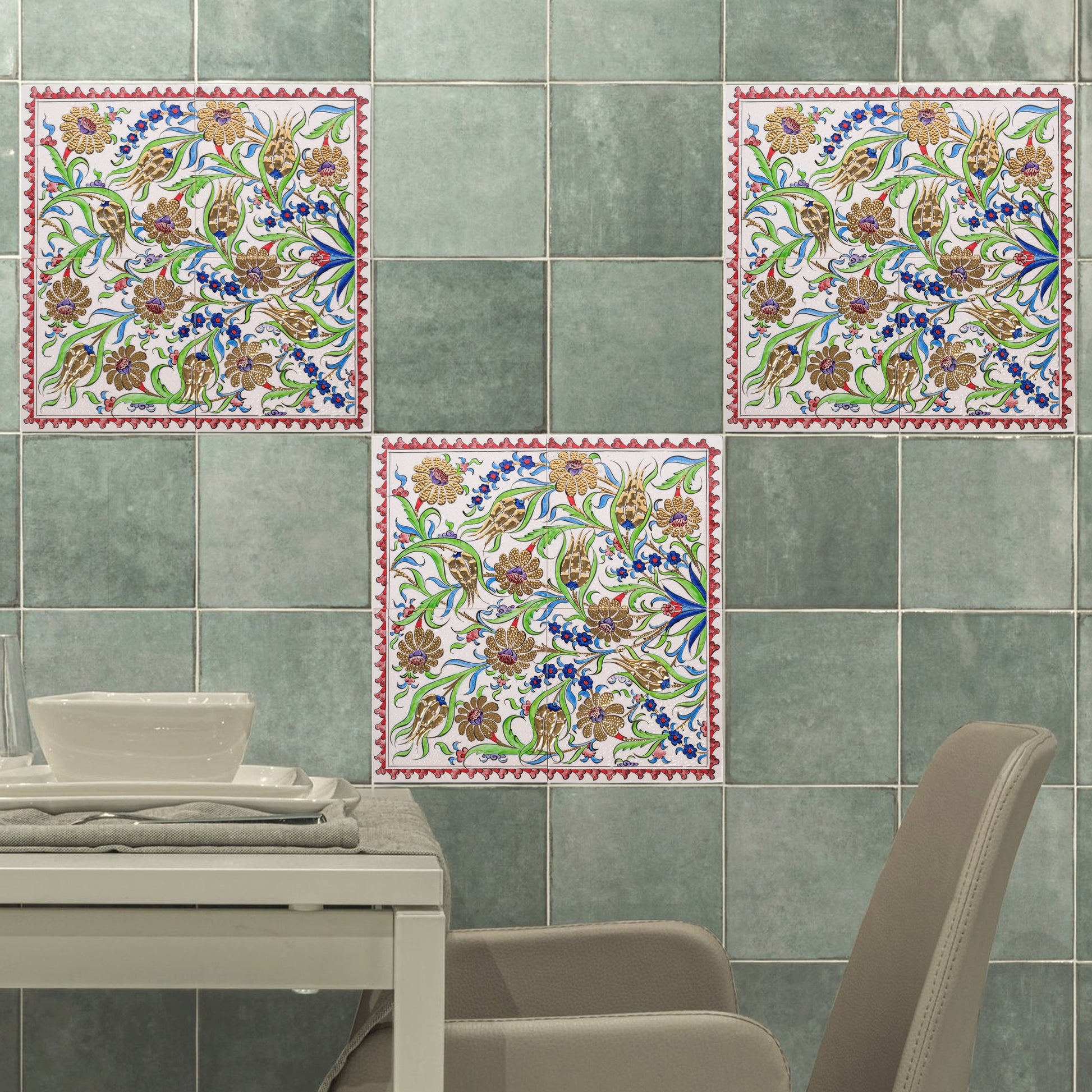 Decorative ceramic tiles with floral patterns on a green tiled wall.