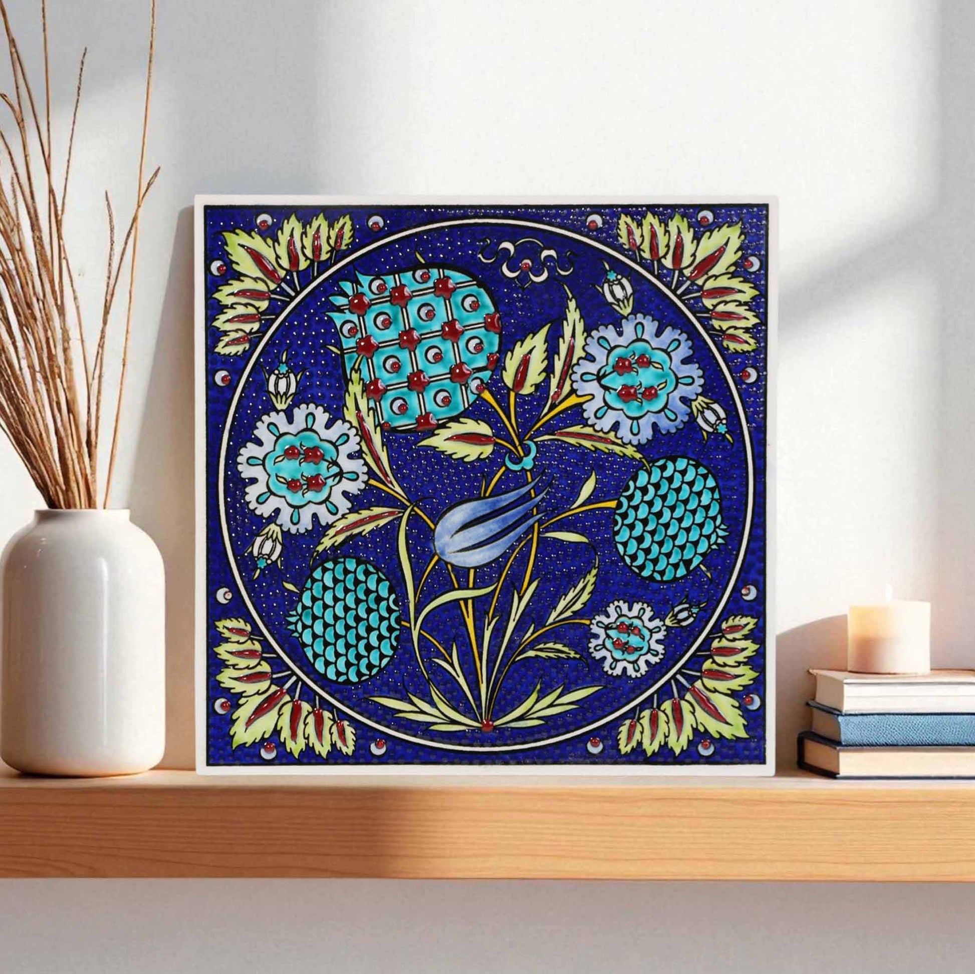 Decorative mosaic ceramic tile with floral design on a shelf