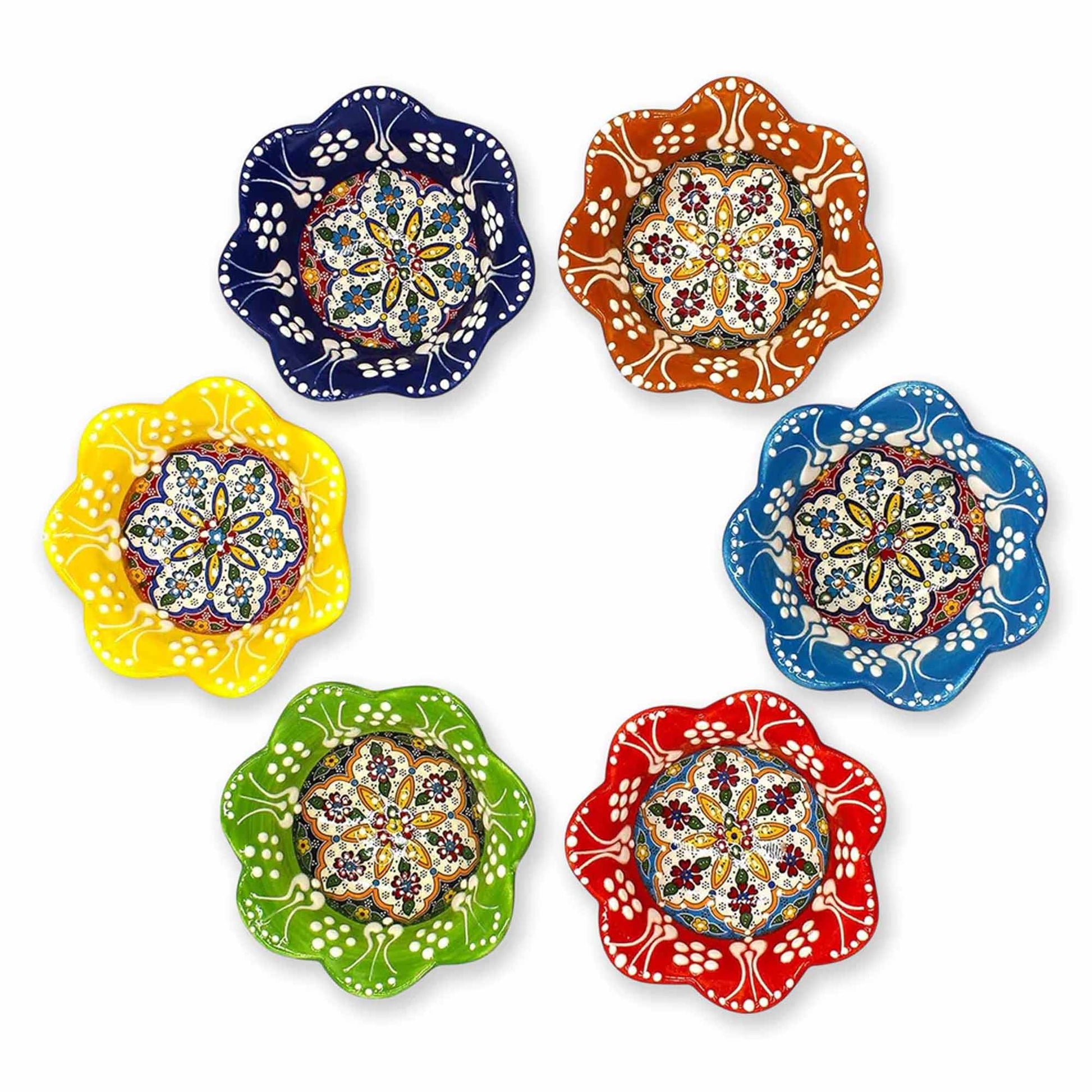 Set of six colorful ceramic dip bowls with floral patterns on a white background