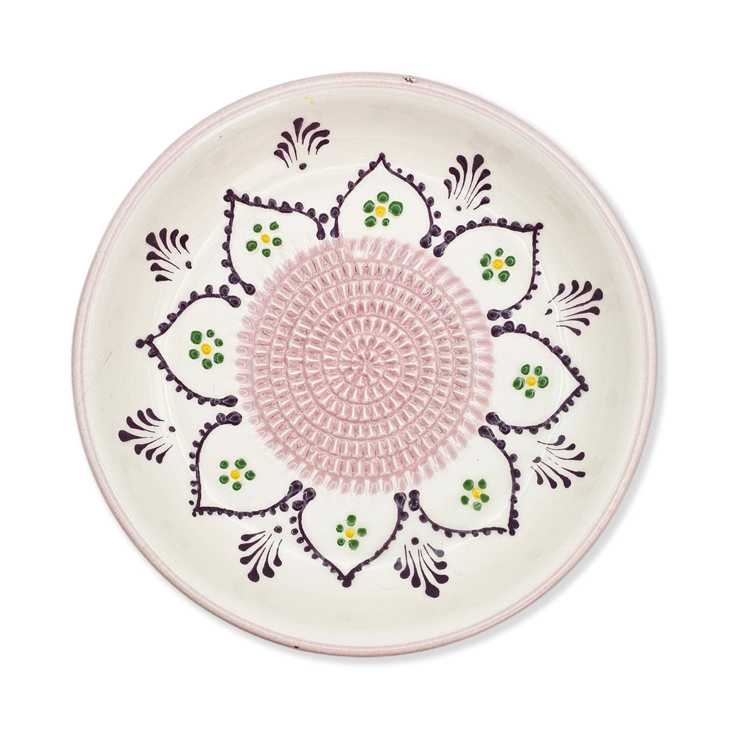 Decorative garlic grater bowl with pink center and floral patterns on a white background