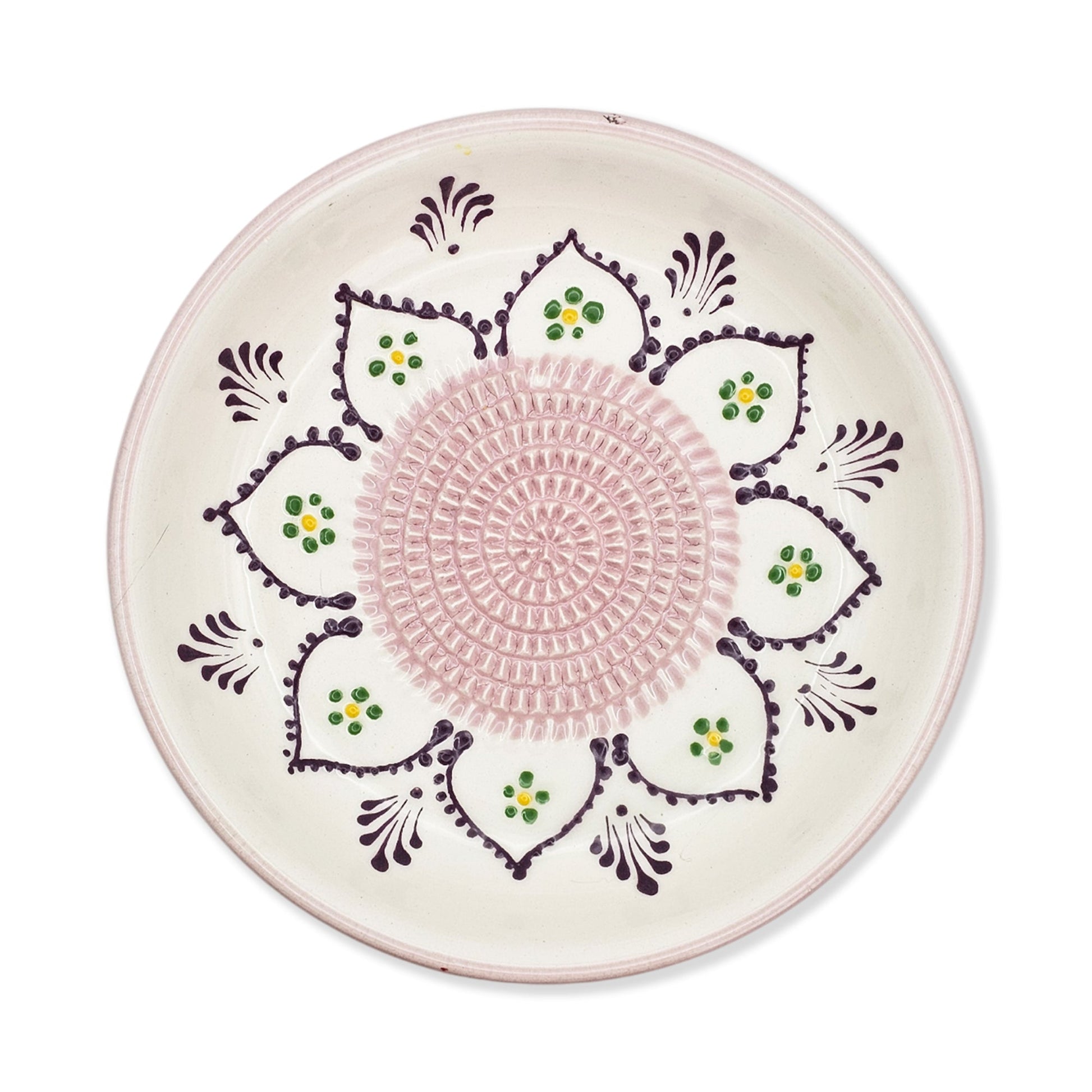 Decorative garlic grater bowl with pink center and floral patterns on a white background