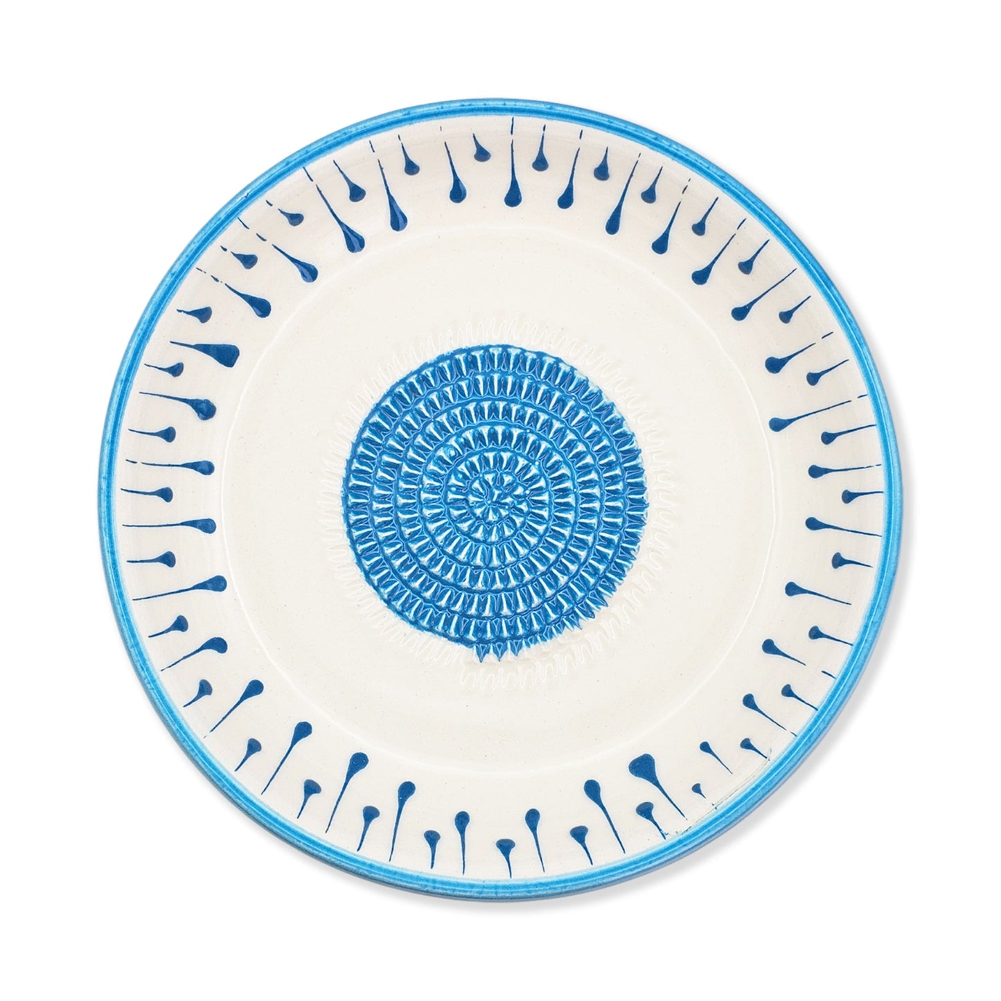 Ceramic garlic grater bowl with blue decorative pattern on a white background