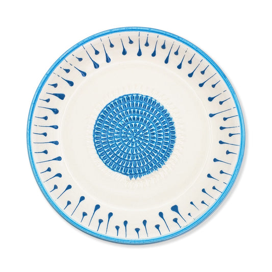 Ceramic garlic grater bowl with blue decorative pattern on a white background