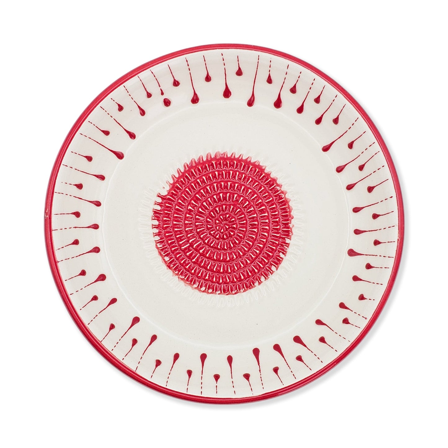 Decorative garlic grater bowl with red and white pattern on a white background
