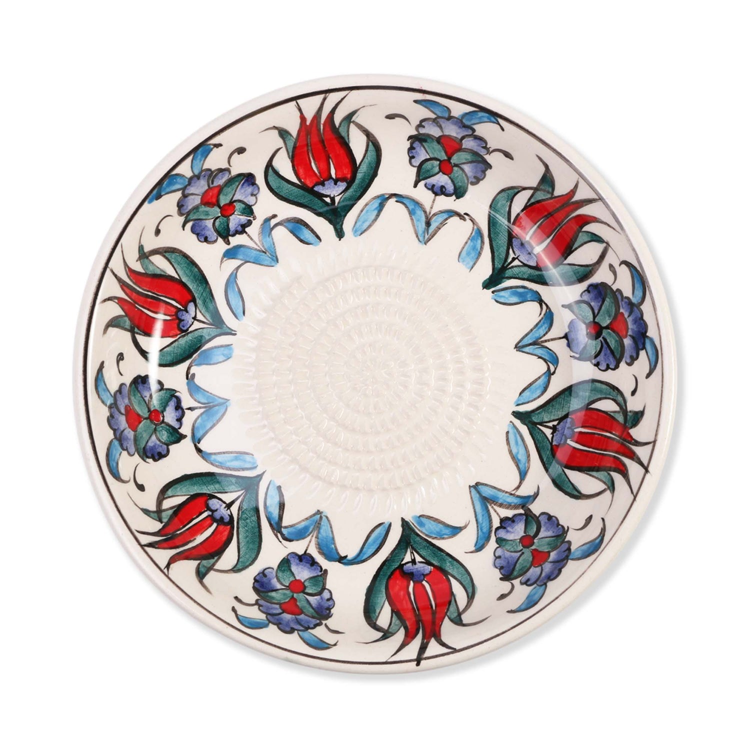 Ceramic garlic grater bowl with floral design on a white background