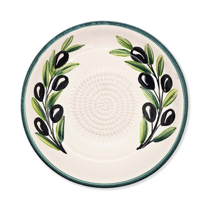 Ceramic garlic grater bowl with olive design on a white background